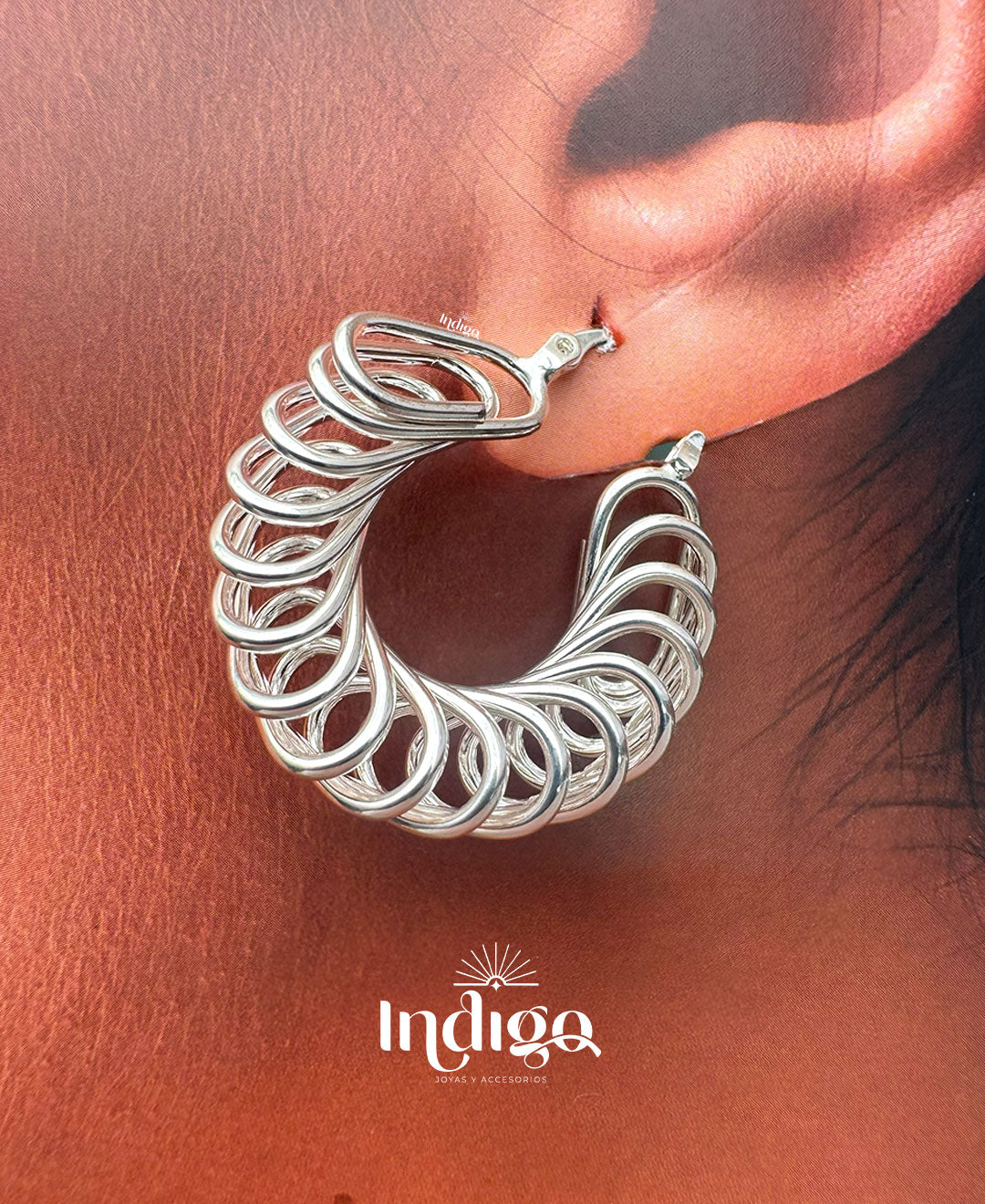 ✨ Candonga Espiral Clip Plateada – Elegancia en Movimiento ✨